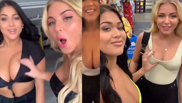 Two girls touching their boobs